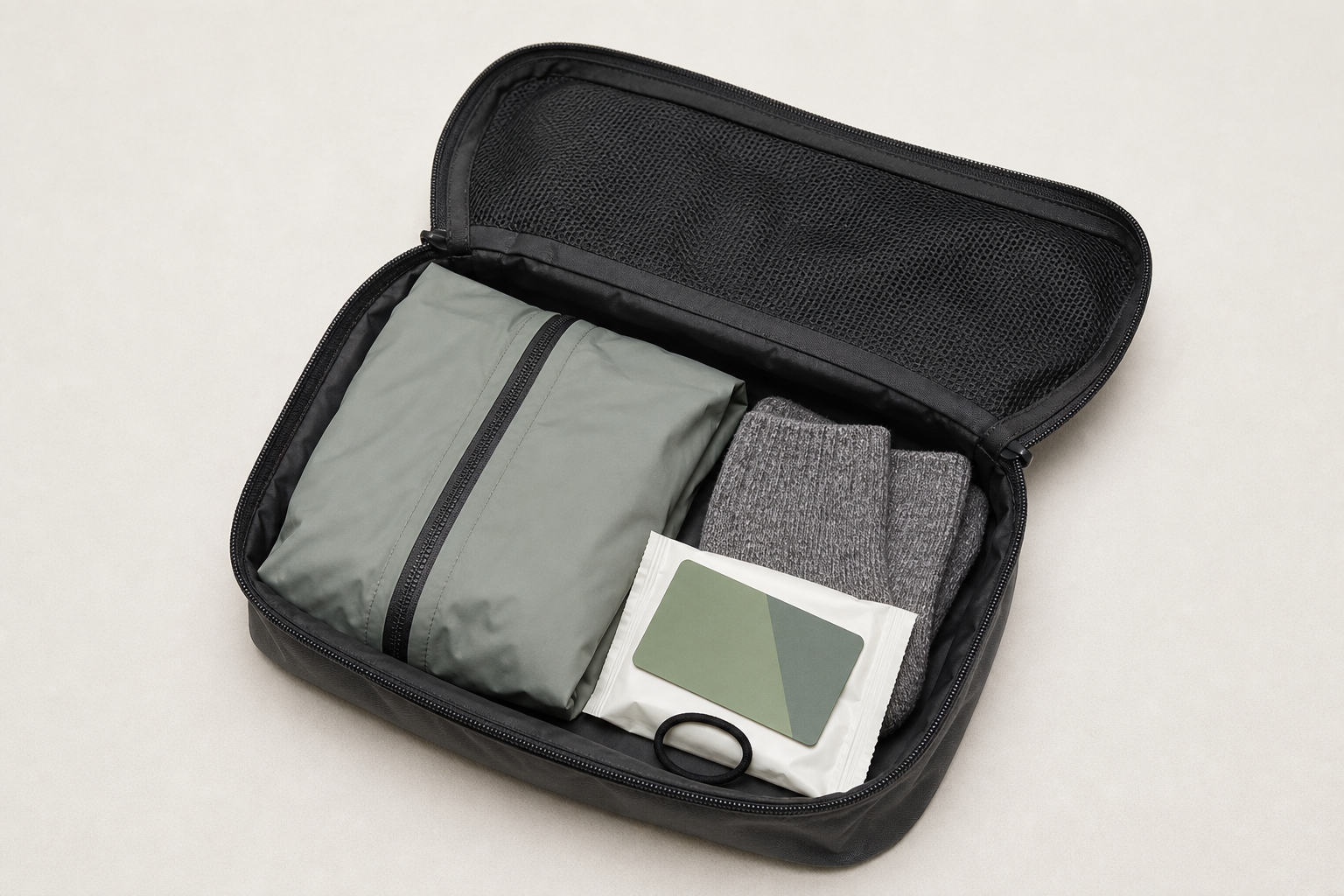 RainFold Outfit Pouch interior organization studio product photo